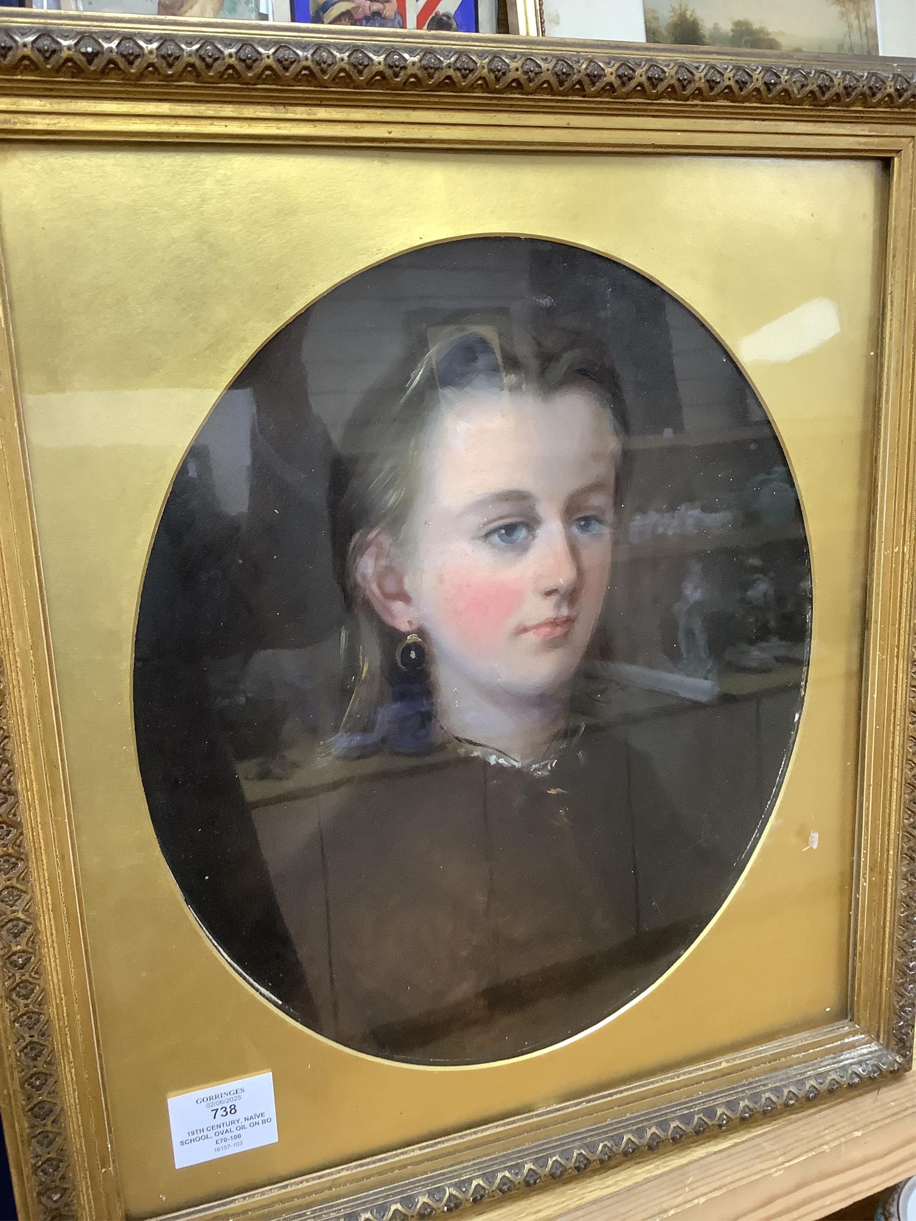 19th century, Naïve school, oval oil on board, three quarter length portrait of a lady, gilt framed, together with a similar portrait of a girl wearing garnet earrings, largest 34 x 24cm